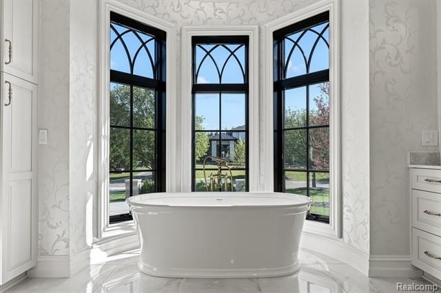 NEW CONSTRUCTION. Experience elevated luxury living in this - photo 29