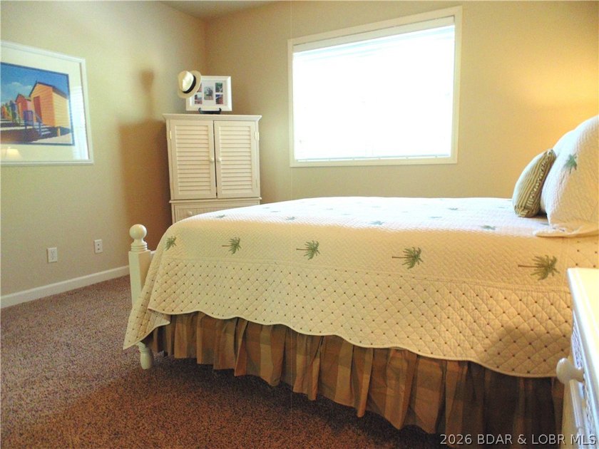 LUXURY SUMMER PLACE CONDO at Lake of the Ozarks - TURNKEY! This - photo 31