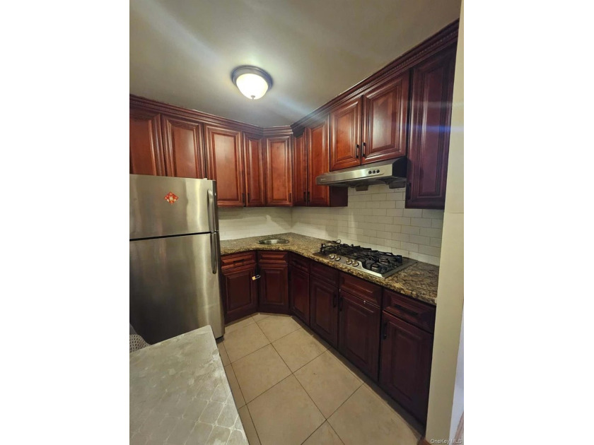 Nestled in heart of downtown Flushing, this spacious condo - photo 2