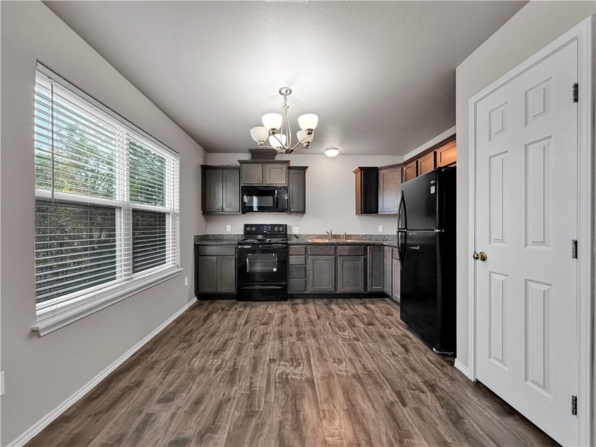 Move-in ready! This beautifully updated 3-bedroom, 2-bath home - photo 9