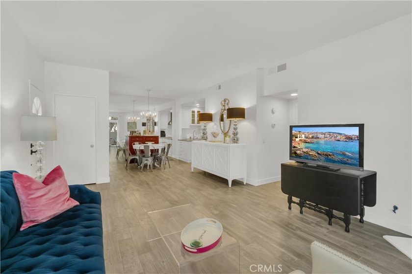 Tucked inside the gated Villa Point community, this lower-level - photo 3