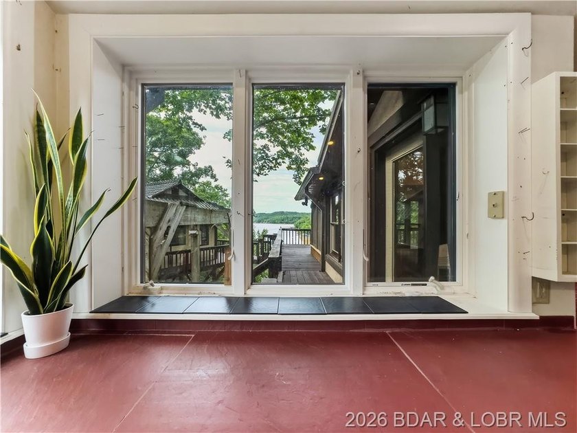 Not every lakefront property fits neatly into a box-and that is - photo 20