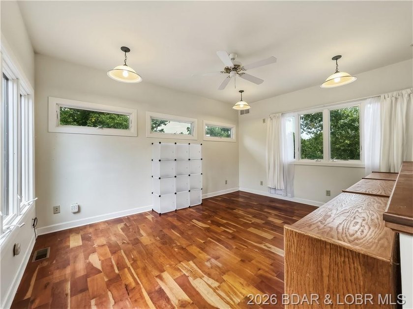 Not every lakefront property fits neatly into a box-and that is - photo 26