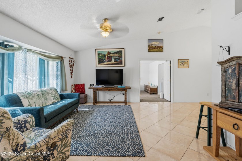 RARE find! This well-maintained 3/2/2 home sits on a half-acre - photo 8