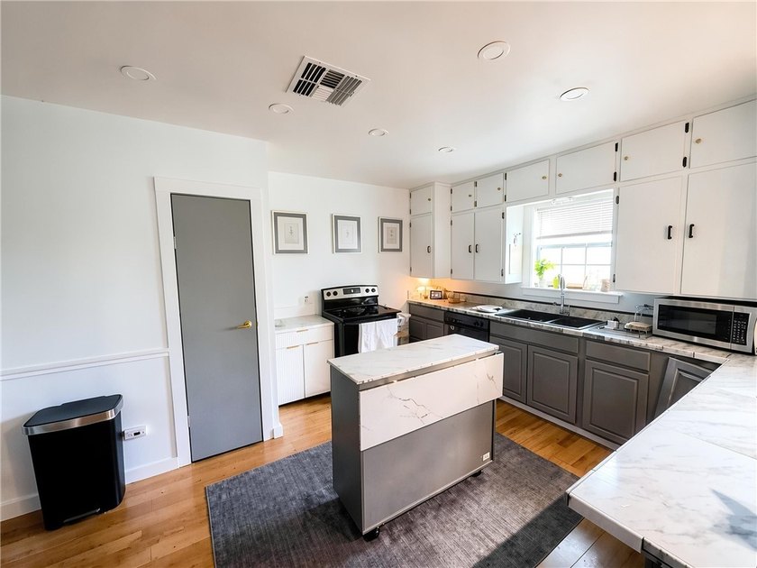 Welcome to this charming 3-bedroom home located in the desirable - photo 8