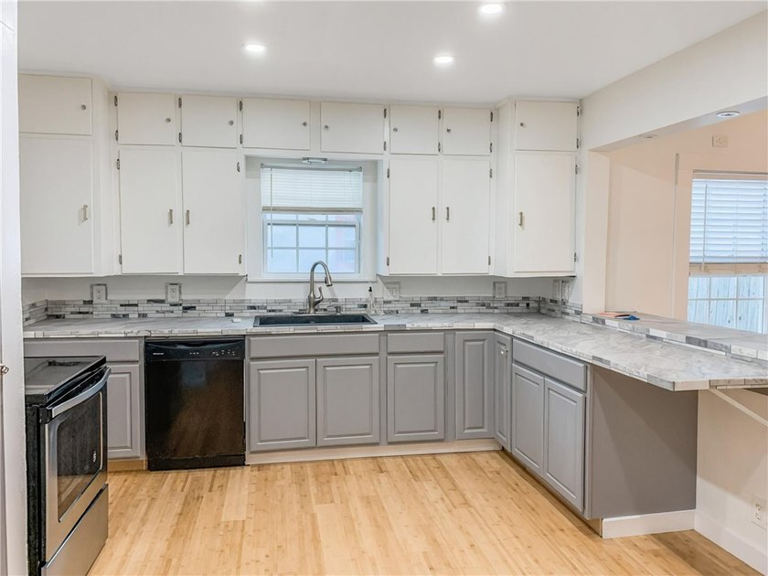 Welcome to this charming 3-bedroom home located in the desirable - photo 9