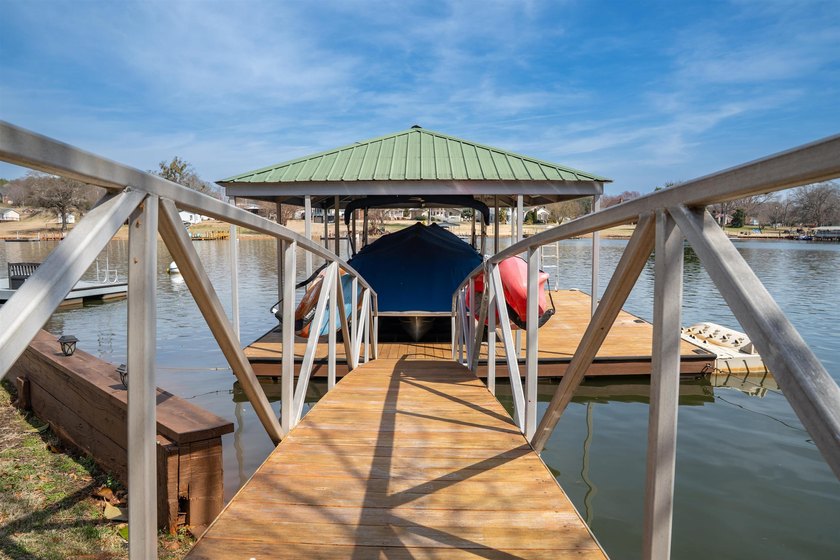 MOTIVATED SELLERS! Welcome to lakefront living at its finest on - photo 44