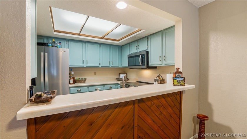 Discover lakeside living at its finest with this cozy 2-bed - photo 6