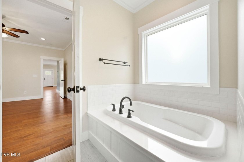 Modern farmhouse charm, an incredible 1.3-acre creekside setting - photo 14