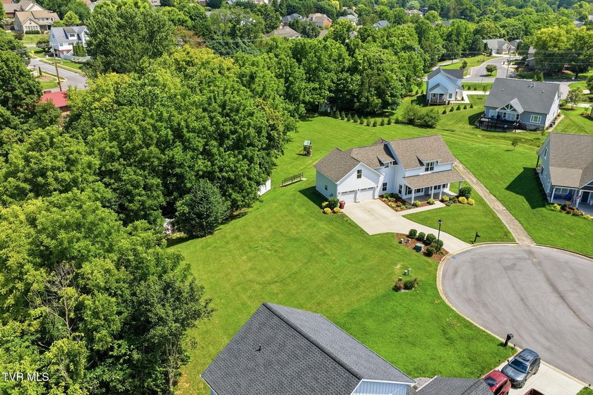 Modern farmhouse charm, an incredible 1.3-acre creekside setting - photo 38