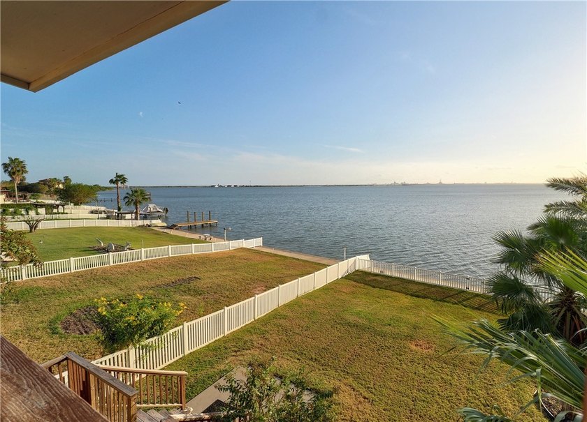 Wake up to breathtaking views of Nueces Bay from this waterfront - photo 6