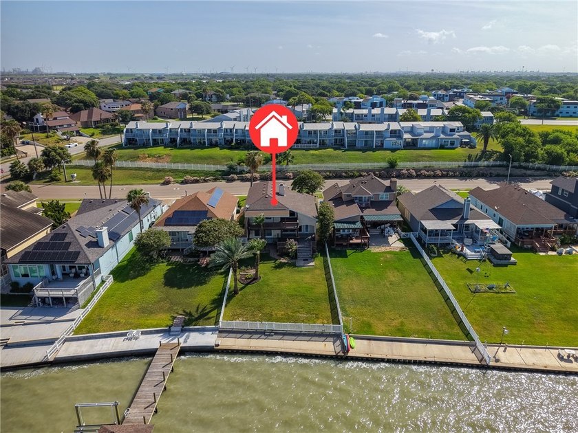Wake up to breathtaking views of Nueces Bay from this waterfront - photo 7