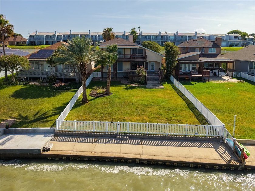Wake up to breathtaking views of Nueces Bay from this waterfront - photo 8