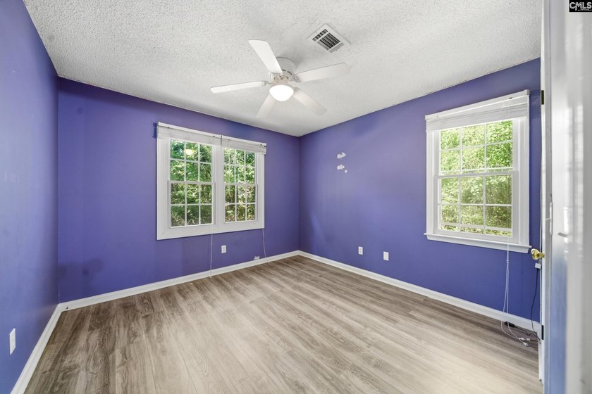 Tucked away at the end of a quiet cul-de-sac, this townhome is - photo 16