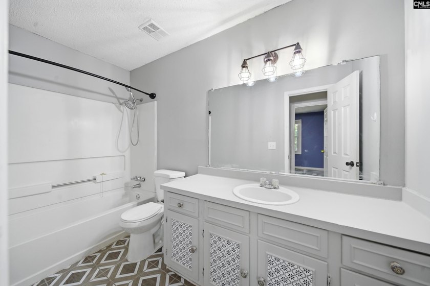 Tucked away at the end of a quiet cul-de-sac, this townhome is - photo 19