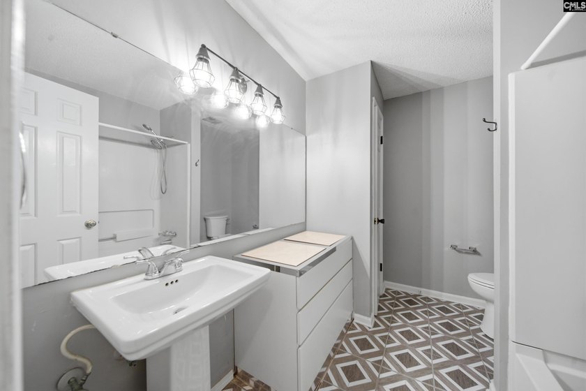 Tucked away at the end of a quiet cul-de-sac, this townhome is - photo 21
