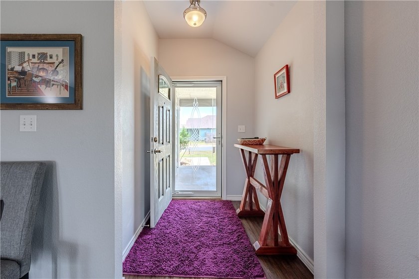 Welcome to this well-maintained 3-bedroom, 2-bath home with a - photo 3
