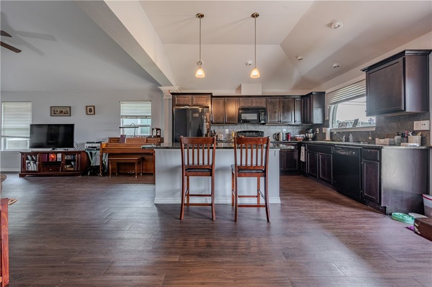 Welcome to this well-maintained 3-bedroom, 2-bath home with a - photo 7