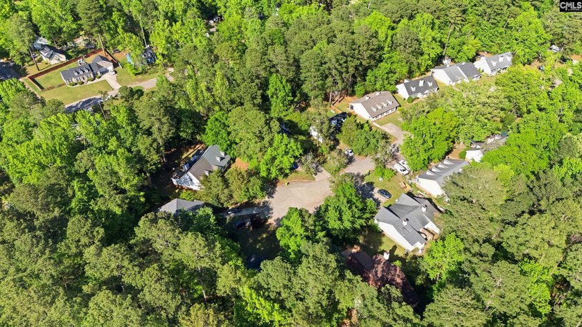Tucked away at the end of a quiet cul-de-sac, this townhome is - photo 36