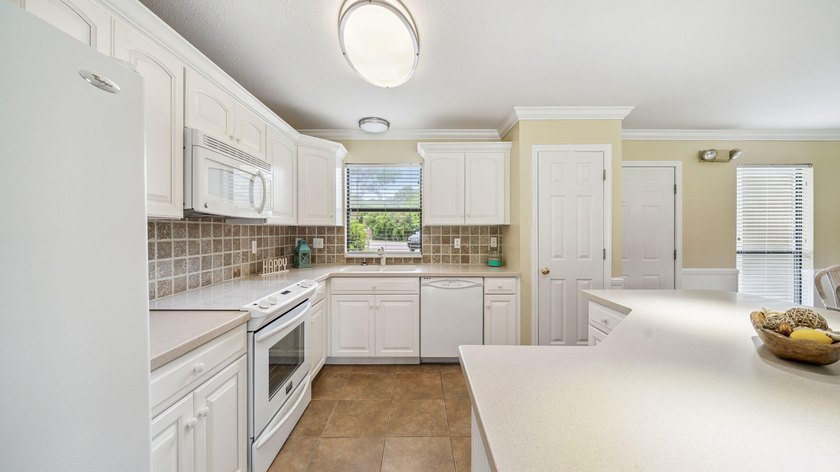 NO STAIRS!!!! This three-bedroom, two-and-a-half-bath unit - photo 6