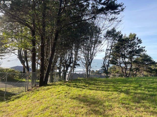 GATED FLAT .65 AC LOT WITH BEAUTIFUL OCEAN VIEW. This lot is NOT - photo 12