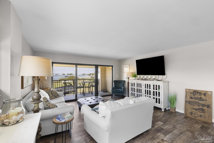 Experience coastal living at its finest in this beautifully - photo 2