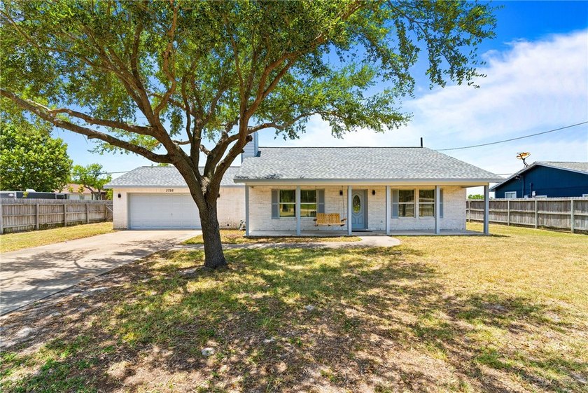 Situated on just under an acre within the city limits and - photo 2