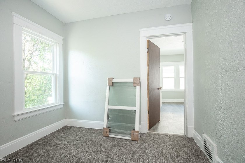 The large fully rehabbed duplex is waiting for you today - photo 25