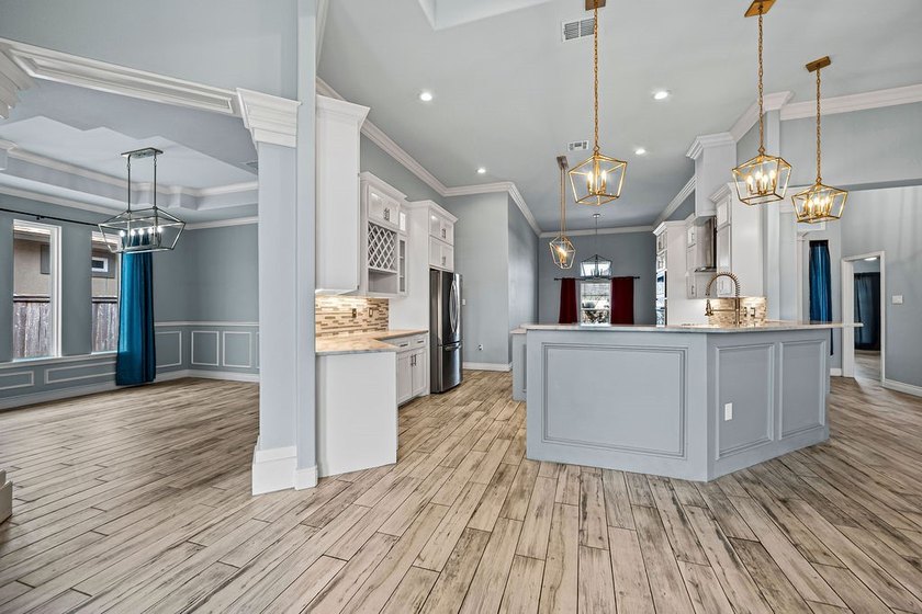 Experience luxury living in this stunning custom-built home - photo 7