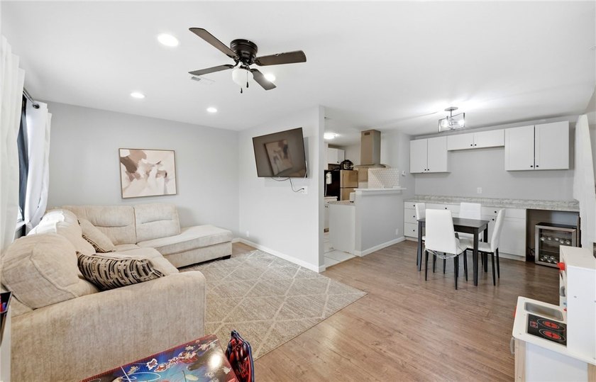 Desirable Lakewood Village featuring laminate and tile flooring - photo 4
