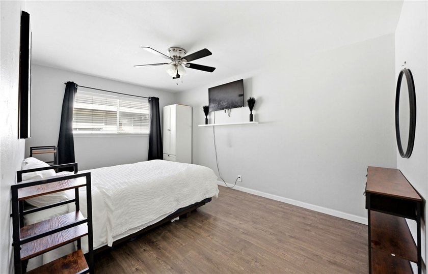 Desirable Lakewood Village featuring laminate and tile flooring - photo 10