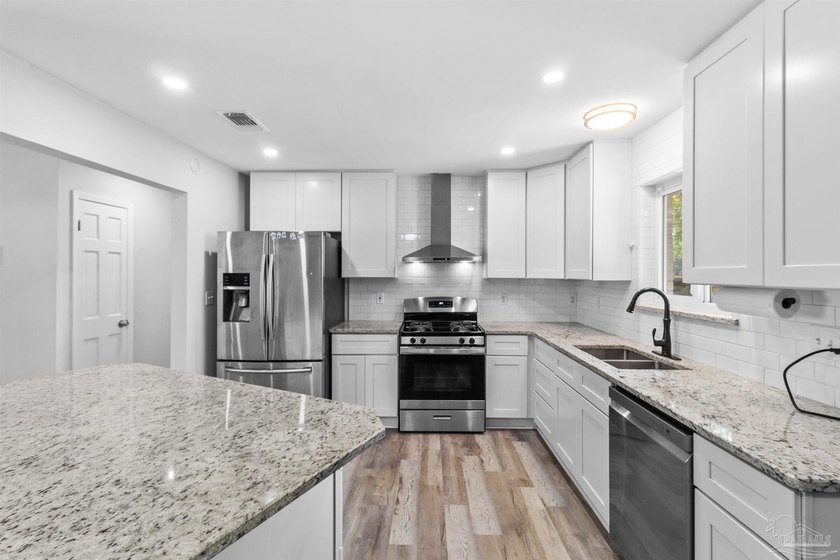 NOW FEATURING FULLY PAID OFF SOLAR PANELS This fully renovated 4 - photo 8