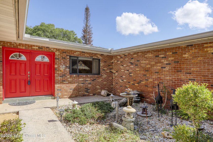 Welcome home to this beautiful 4 bedroom, 2 bath pool home in - photo 6
