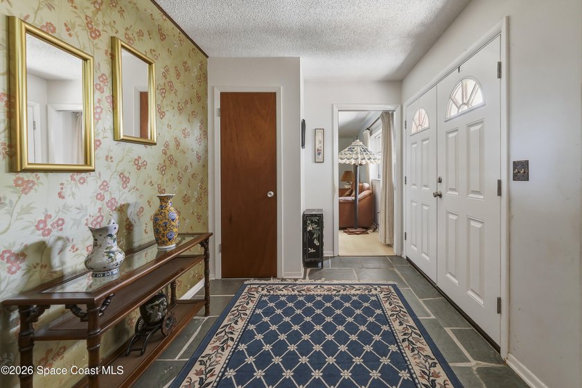 Welcome home to this beautiful 4 bedroom, 2 bath pool home in - photo 7