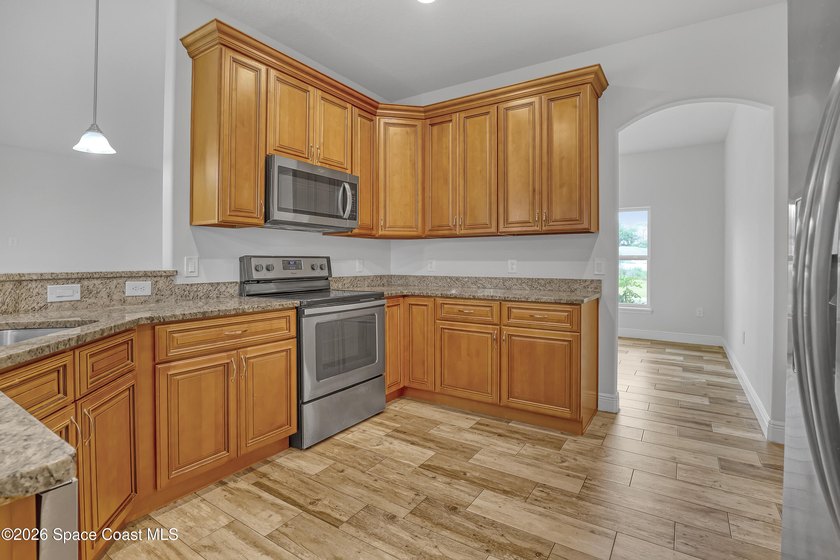 Welcome to 1366 Tarleton St, a masterfully designed home that - photo 7