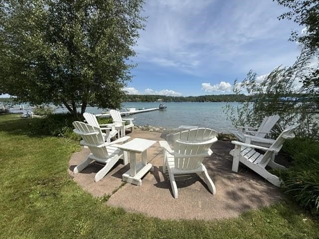 Located on Walloon Lakes' West arm, this property offers - photo 3