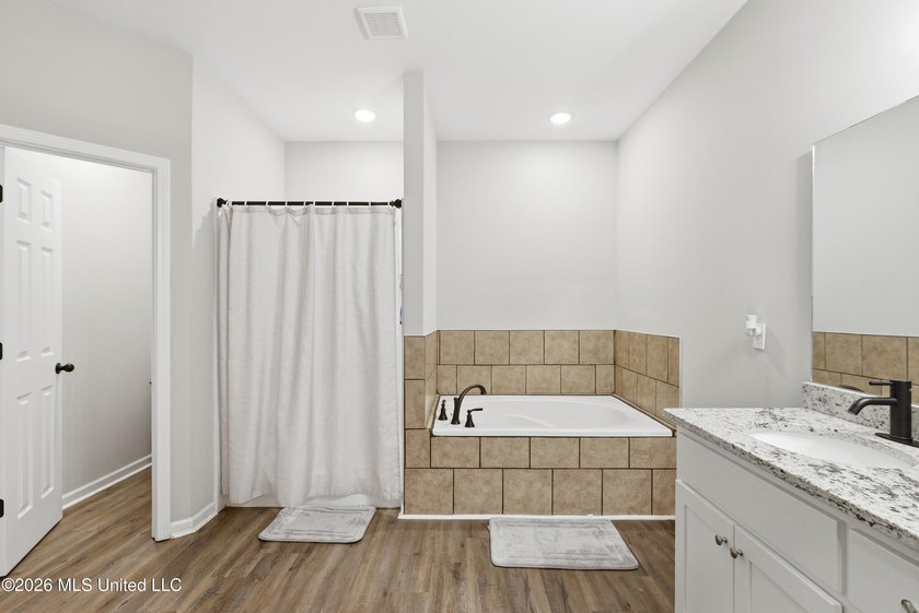 Better than New ~ Built in 2023 ~ 4 Bedroom 3 Bath Home with - photo 13
