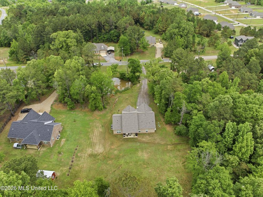 Better than New ~ Built in 2023 ~ 4 Bedroom 3 Bath Home with - photo 23