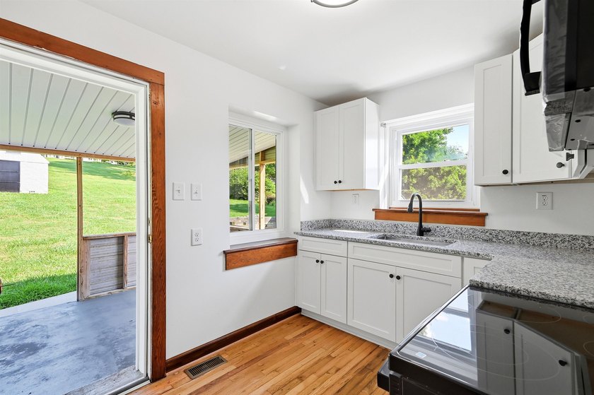 Filled w/ character &amp; charm, this beautifully updated - photo 15