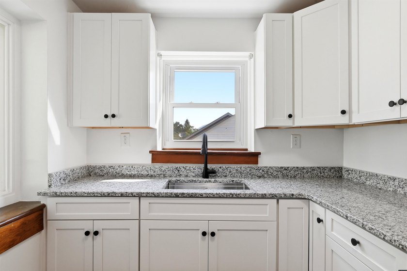 Filled w/ character &amp; charm, this beautifully updated - photo 17