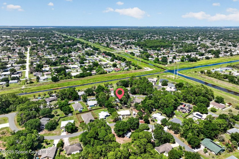 Set on an oversized .46-acre lot with mature trees, this - photo 31