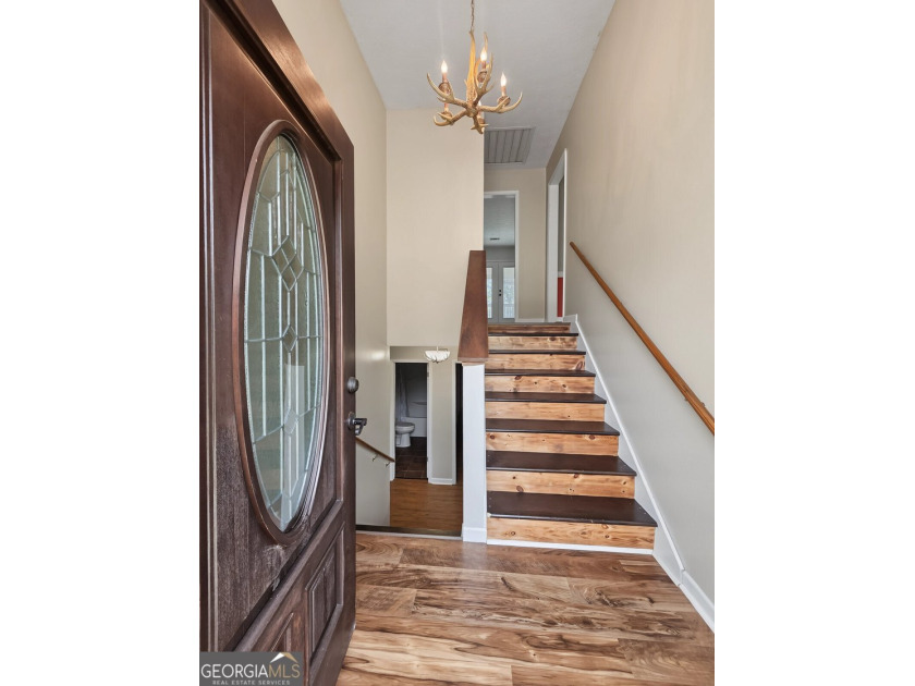 Nestled on 5 private acres with no HOA, this beautifully - photo 3