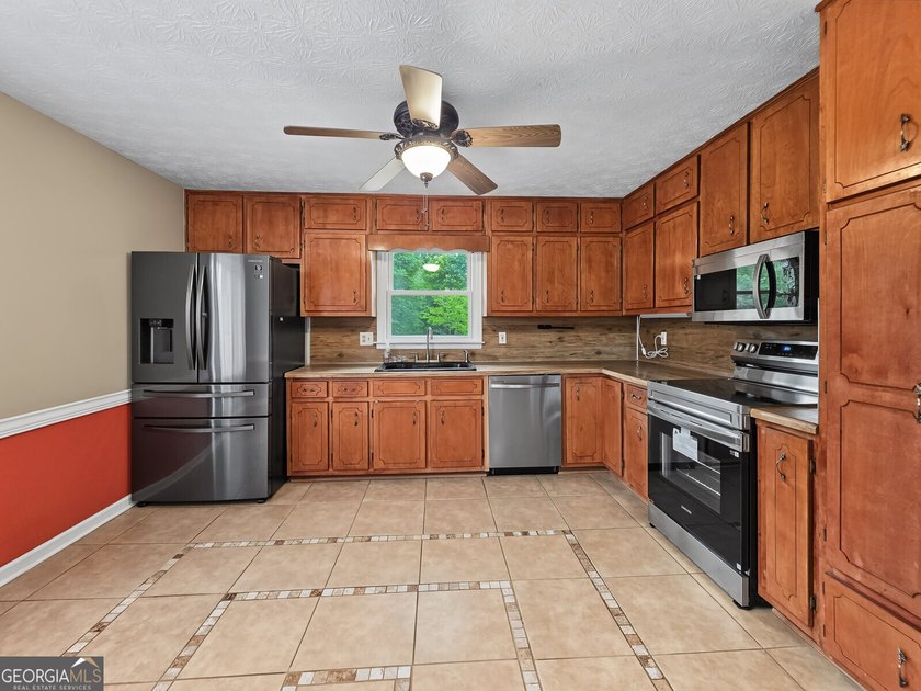 Nestled on 5 private acres with no HOA, this beautifully - photo 9