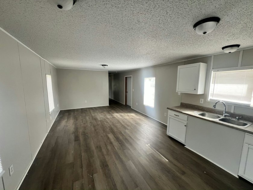 Right now, you could own a 2005 model 3 bed/2 bath, 1056 sq. ft - photo 10