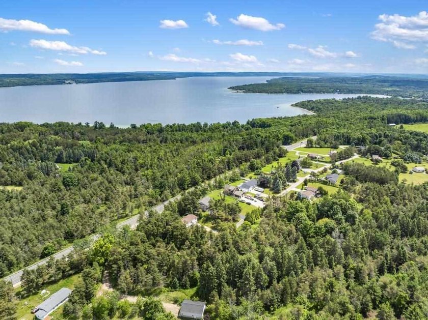 Welcome to this spacious 3 bedroom home in Charlevoix set on 4.2 - photo 8