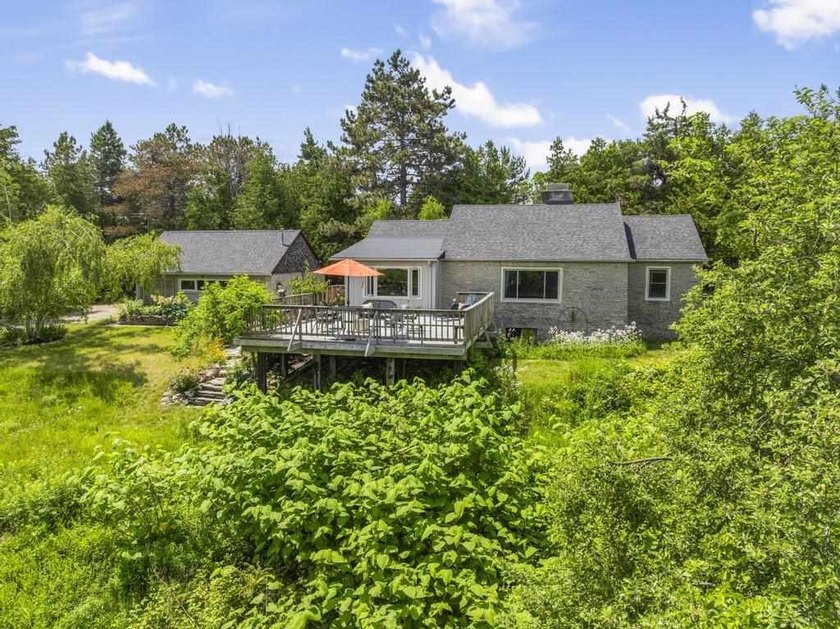 Welcome to this spacious 3 bedroom home in Charlevoix set on 4.2 - photo 10