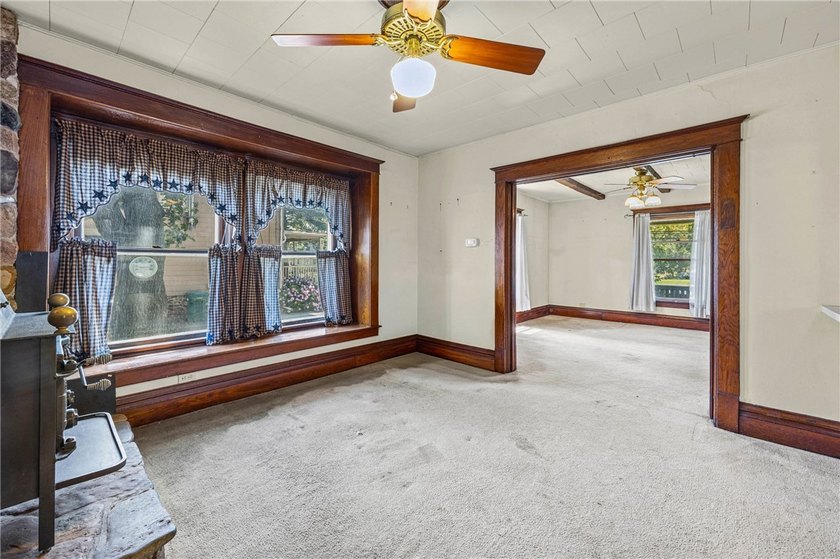 Discover the timeless charm of this 1900s home, rich with - photo 12