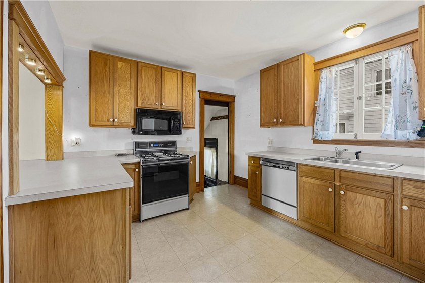 Discover the timeless charm of this 1900s home, rich with - photo 14