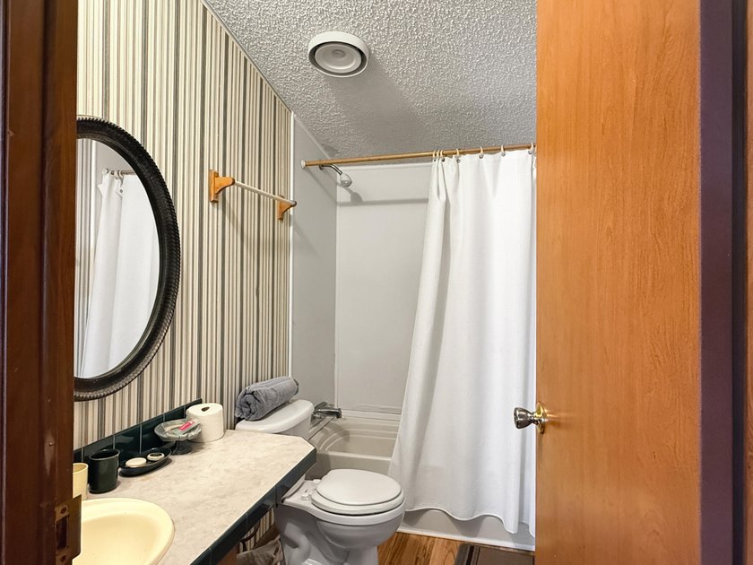 This 3 BR 2 BA home is located on one of the highest lots in the - photo 18