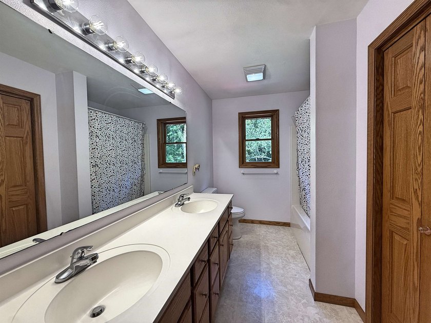 Beautiful rural 4 bedroom home! 2.38 wooded private acres not - photo 29